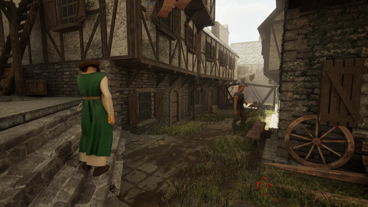 A staff member in the yellow-green server's tabard on the steps outside a Tavern Legends tavern